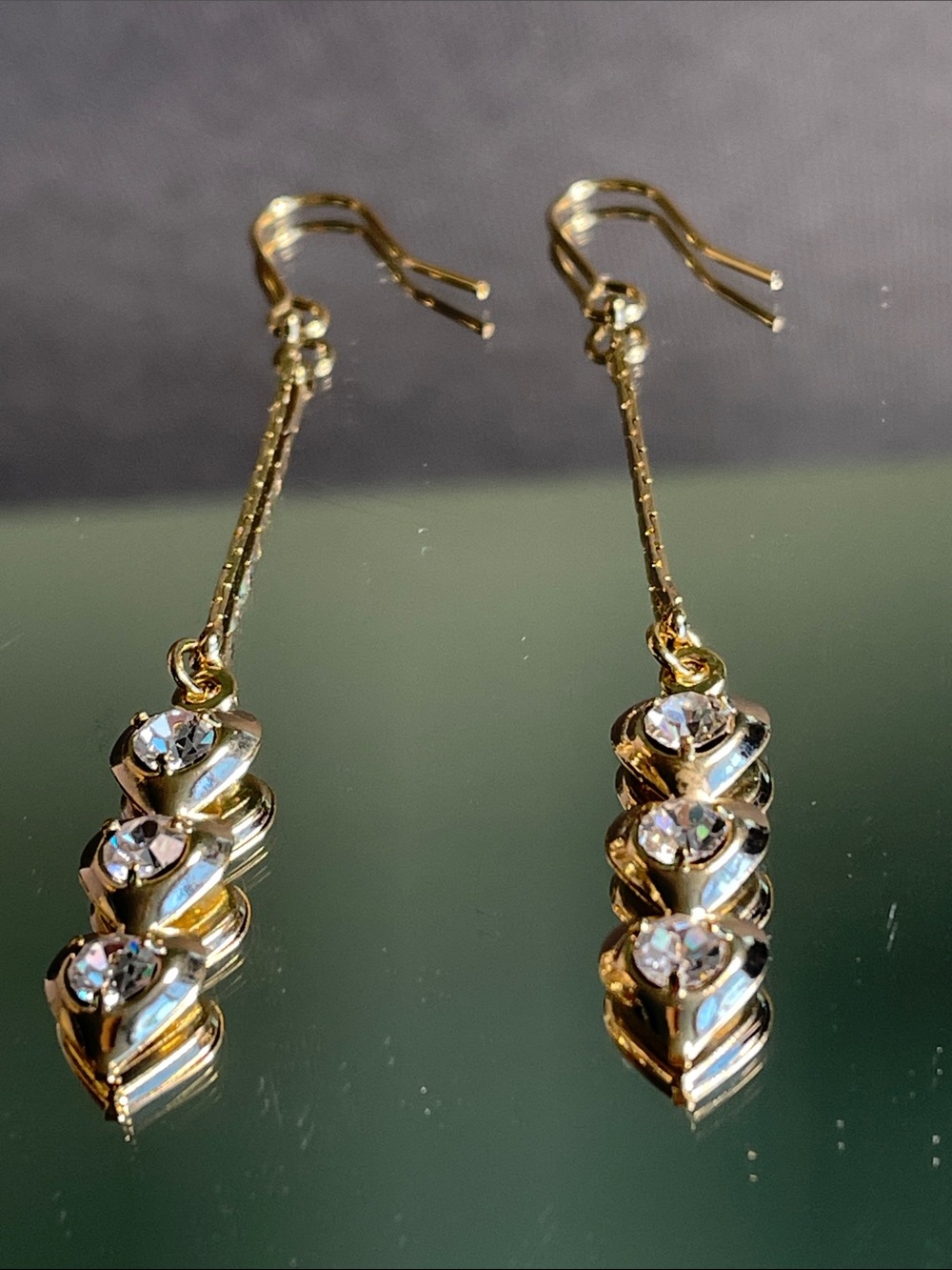 Gold Triple Heart Drop Earrings with Clear Crystals on a chain 2.5” long